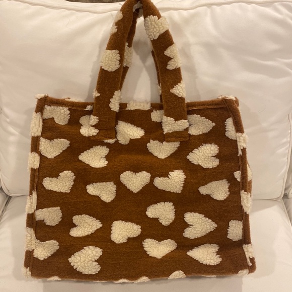 Anthropologie Handbags - Tan fleece and cream heart bag
